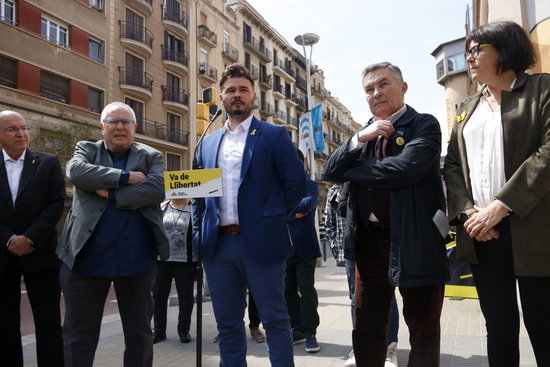 Esquerra Republicana candidate Gabriel Rufián campaigning outside a historic prison in Barcelona